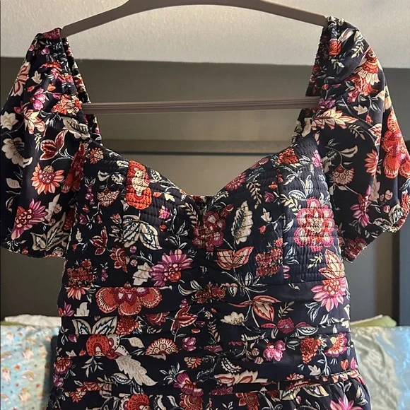 Floral Smocked Jumpsuit with Puff Sleeves - Navy Base with Red & Cream Flowers - Picture 2 of 5